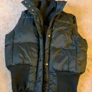 Women's puffer vest. Not worn. Excellent condition